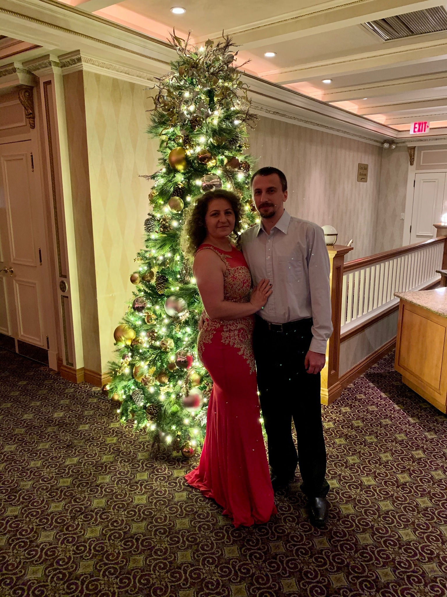 Christmas evening by the tree