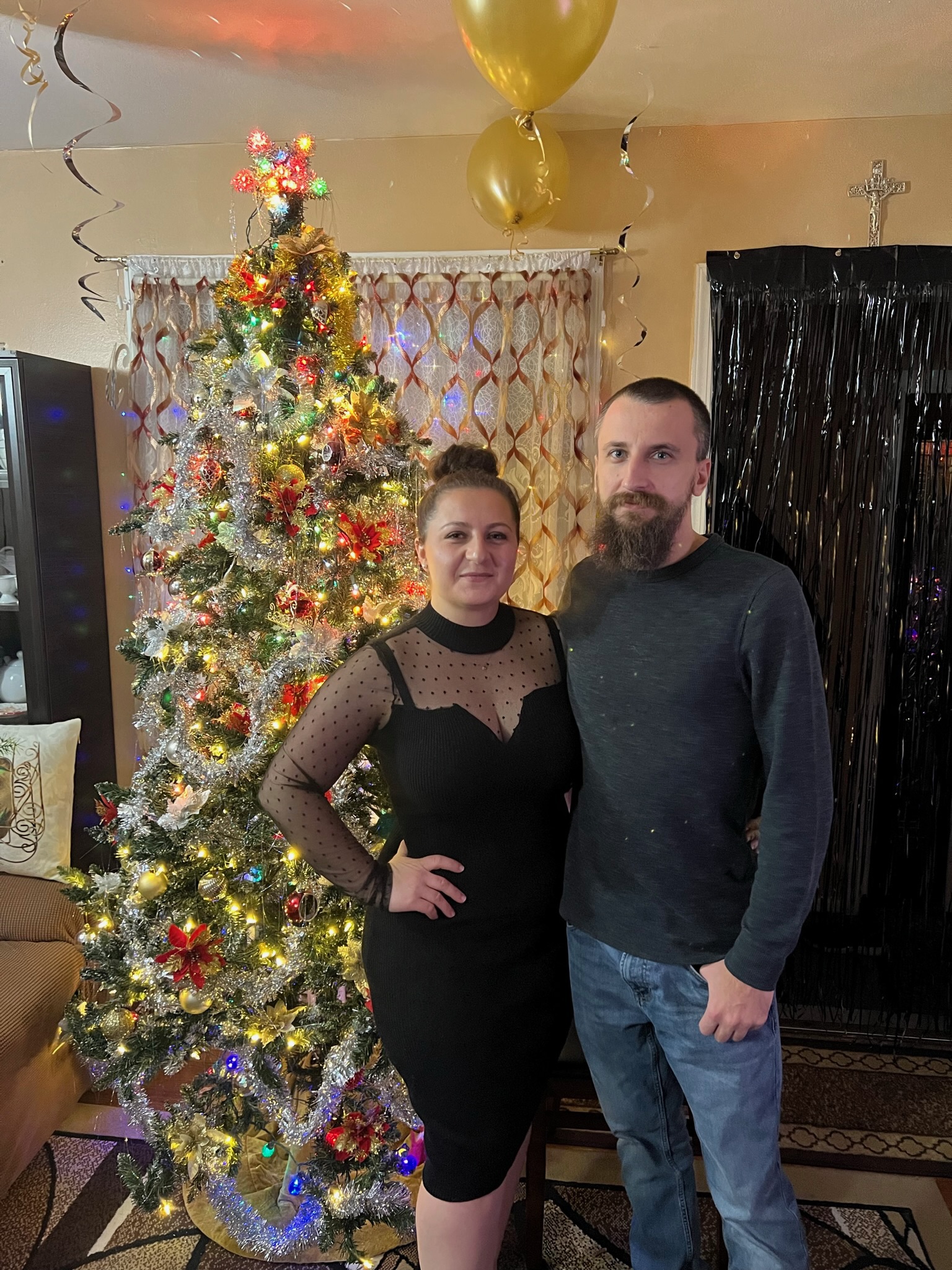 Holiday dressed up by the tree
